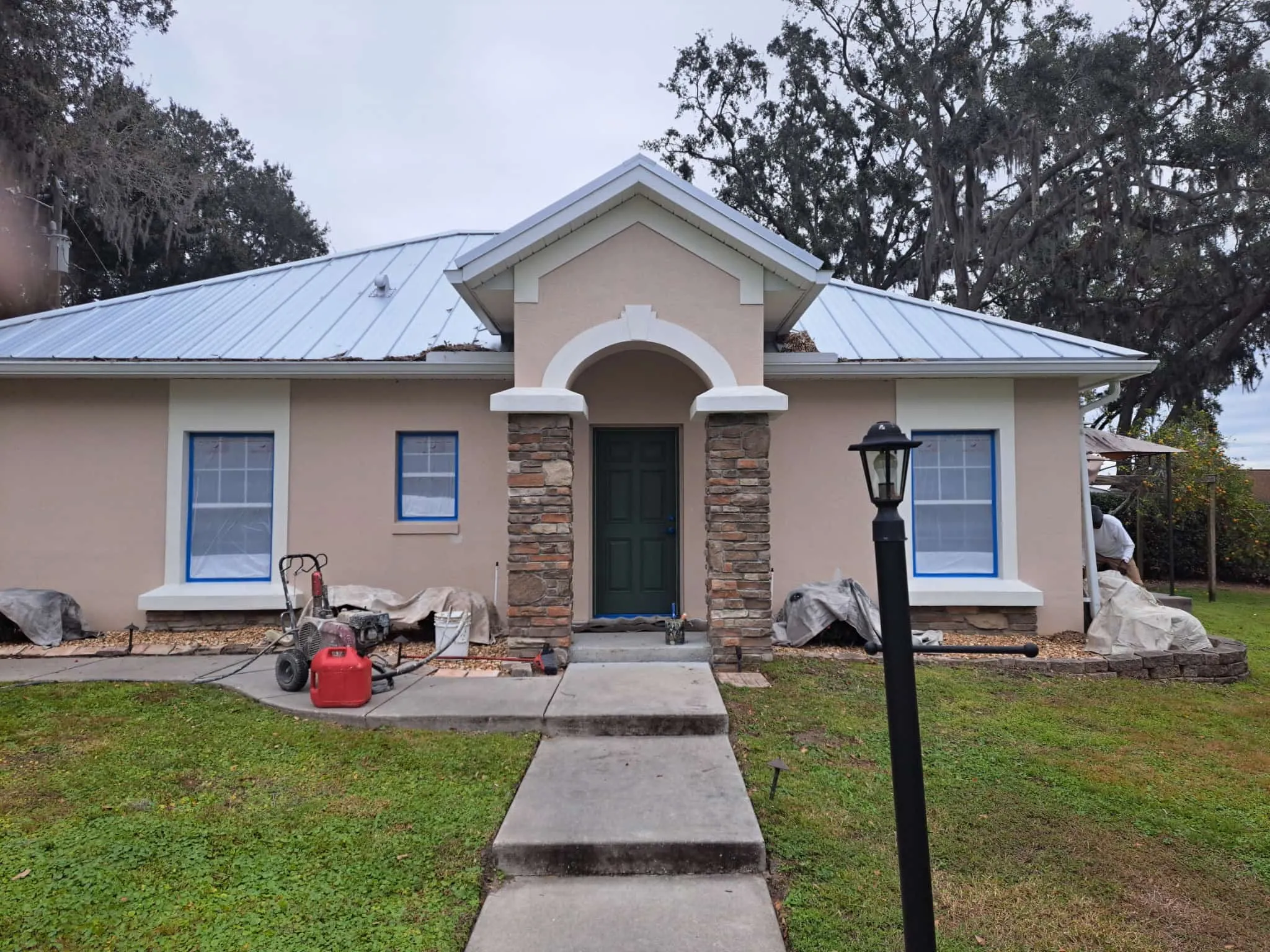 After exterior home coating project with refreshed stucco finish in Orlando Florida